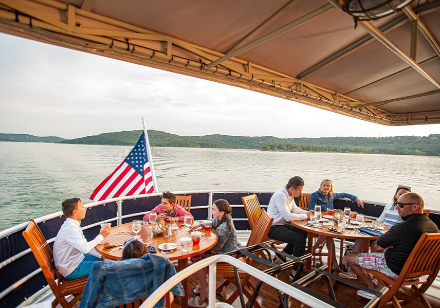 guests enjoy a cruise and meal aboard the lady liberty