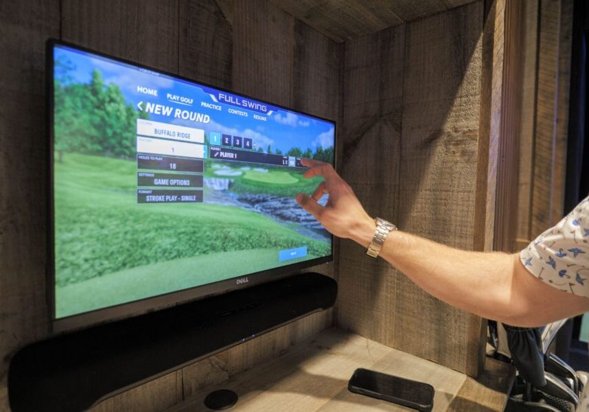 guest makes course selection and enters name into golf simulator