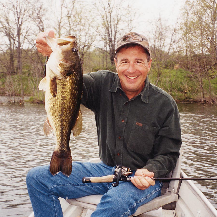 Johnny Morris bass fishing at Table Rock Lake at Big Cedar Johnny L. Morris, owner of Bass Pro Shops and Big Cedar Lodge fishing at Table Rock Lake