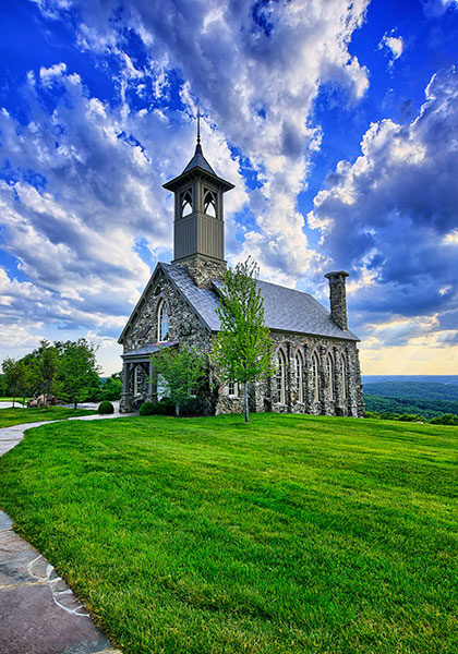 ozarks-chapel-wedding-venue Chapel of the Ozarks with vivid clouds above and Table Rock Lake below