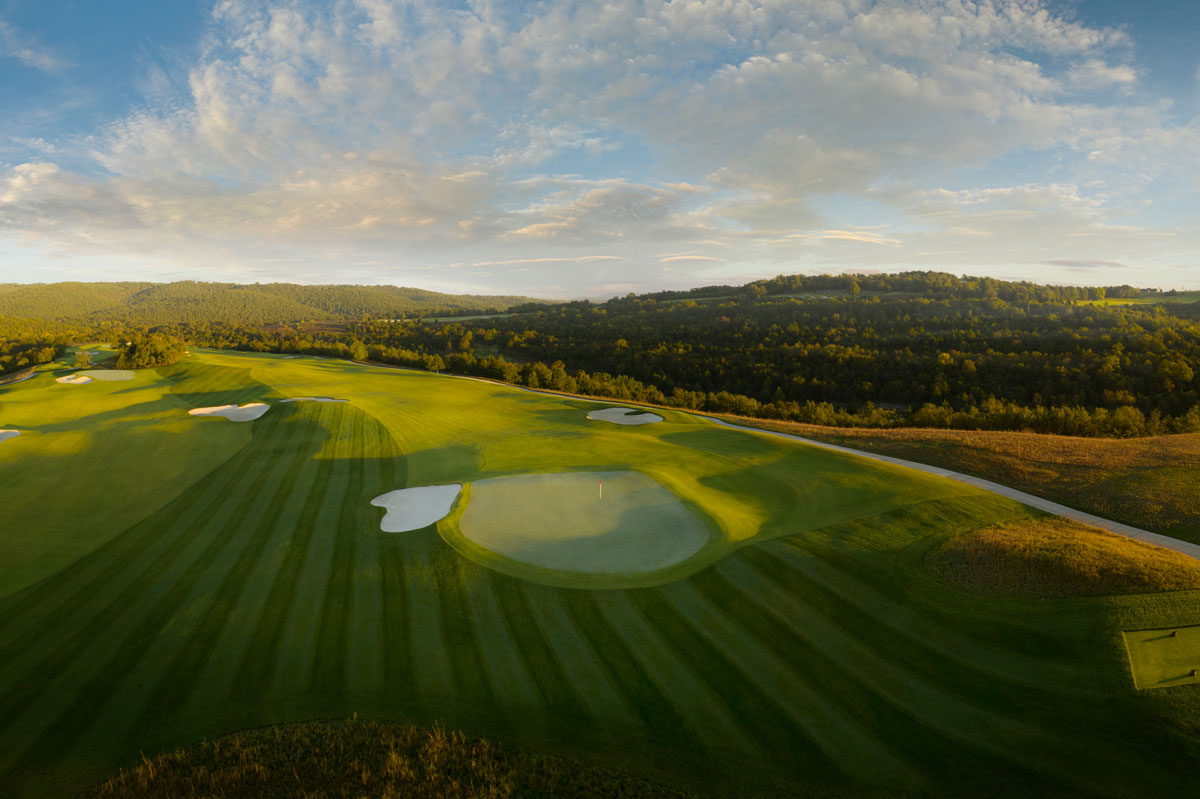 Set among the majestic Ozark Mountains near the Big Cedar Lodge, Payne’s Valley is the first public TGR Design golf course in the United States. Sprawling, wide fairways  showcase playability, while also allowing strategic angles and shot values to be emphasized to challenge experienced players. The green surrounds are designed to promote creativity and a variety of recovery options, while the fairway rough will be maintained to low heights of cut to further promote a fun, enjoyable golf experience.