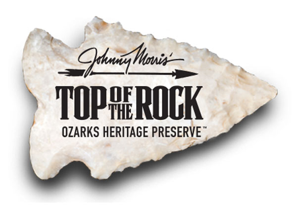 Johnny Morris' Top of the rock Ozarks Heritage Preserve logo on arrow head graphic